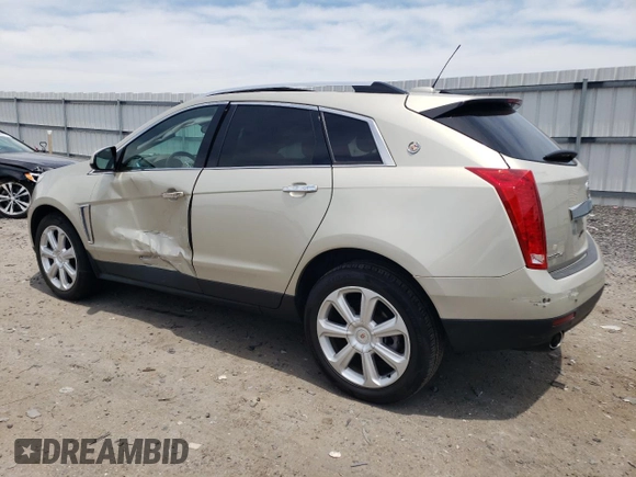 2016 Cadillac SRX Performance Collection with VIN 3GYFNCE32GS508631, listed as a Copart auction lot 60660554 with 92,025 mi miles and Salvage title. Bid and sale history available at DreamBid. Image 2.