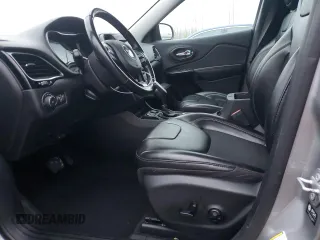 2021 Jeep Cherokee Latitude Plus z VIN 1C4PJLLBXMD143997, wystawiony jako Copart lot #87973025 z przebiegiem 64 267 mil mil oraz Szkoda całkowita • Salvage title. Historia ofert i sprzedaży dostępna na DreamBid. Obrazek 7.