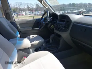 2002 Mitsubishi Montero XLS z VIN JA4MW31R52J070132, wystawiony jako IAAI lot #41782522 z przebiegiem 92 575 mil mil oraz . Historia ofert i sprzedaży dostępna na DreamBid. Obrazek 5.
