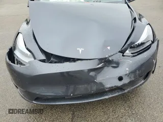 2024 Tesla Model Y Long Range с VIN 7SAYGDEE7RF180945, выставлен на аукционе Copart как лот 62059735 с пробегом Не указан миль и Списание • Salvage title. История ставок и продаж доступна на DreamBid. Изображение 12.
