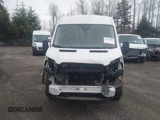 2016 Ford Transit Cargo with VIN 1FTYR2CM1GKB06300, listed as a IAAI auction lot 41636486 with 159,916 mi miles and . Bid and sale history available at DreamBid. Image 13.