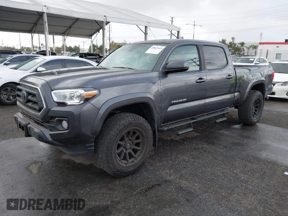 2022 Toyota Tacoma SR5 with VIN 3TMBZ5DN2NM034561, listed as a IAAI auction lot 40867443 with 51,728 mi miles and . Bid and sale history available at DreamBid. Image 17.