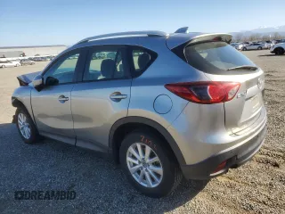 2014 Mazda CX-5 Sport with VIN JM3KE2BE1E0350718, listed as a Copart auction lot 46370205 with 98,065 mi miles and Salvage title. Bid and sale history available at DreamBid. Image 2.