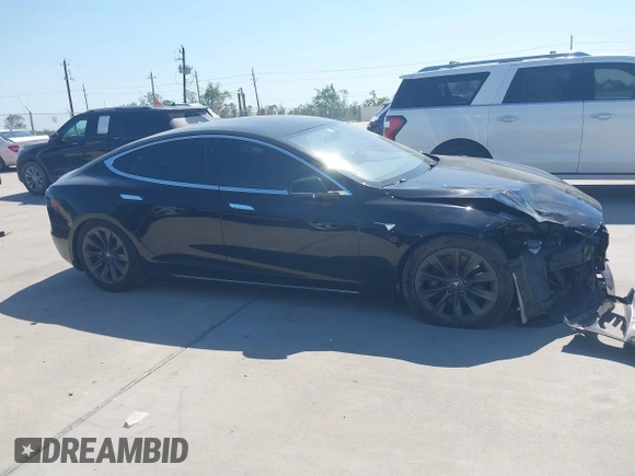 2020 Tesla Model S Long Range with VIN 5YJSA1E27LF397346, listed as a IAAI auction lot 40579015 with 43,779 mi miles and . Bid and sale history available at DreamBid. Image 13.