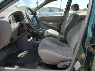 2000 Ford Escort with VIN 3FAFP13P6YR167405, listed as a Copart auction lot 60447535 with 128,413 mi miles and Clean title. Bid and sale history available at DreamBid. Image 7.