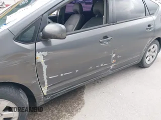 2006 Toyota Prius z VIN JTDKB20U567081644, wystawiony jako IAAI lot #42328410 z przebiegiem 138 708 mil mil oraz . Historia ofert i sprzedaży dostępna na DreamBid. Obrazek 6.