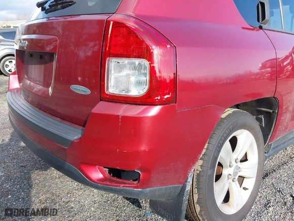 2012 Jeep Compass Latitude with VIN 1C4NJDEBXCD697985, listed as a IAAI auction lot 41653985 with 151,492 mi miles. Bid and sale history available at carsss.com. Image 6.