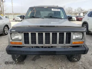 2001 Jeep Cherokee Sport z VIN 1J4FF58SX1L576572, wystawiony jako Copart lot #48982965 z przebiegiem 174 500 mil mil oraz Szkoda całkowita • Salvage title. Historia ofert i sprzedaży dostępna na DreamBid. Obrazek 5.