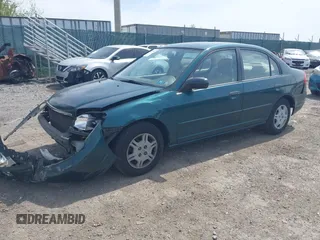 2001 Honda Civic LX with VIN JHMES16531S009904, listed as a IAAI auction lot 42079635 with 182,269 mi miles. Bid and sale history available at carsss.com. Image 2.
