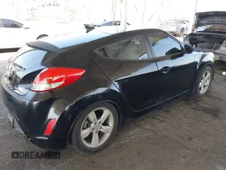 2013 Hyundai Veloster w/Black Int with VIN KMHTC6AD6DU088815, listed as a IAAI auction lot 42184776 with 204,930 mi miles and . Bid and sale history available at DreamBid. Image 4.