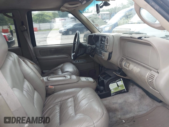 1999 GMC Suburban with VIN 3GKFK16R2XG501319, listed as a IAAI auction lot 42491117 with 231,561 mi miles and . Bid and sale history available at DreamBid. Image 5.