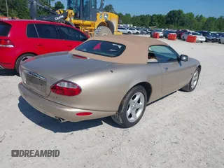 2002 Jaguar XK with VIN SAJDA42C32NA24378, listed as a IAAI auction lot 42205854 with 92,612 mi miles and . Bid and sale history available at DreamBid. Image 4.