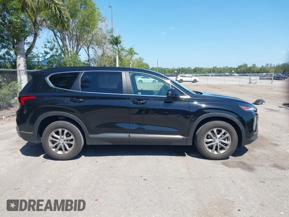 2019 Hyundai Santa Fe SE with VIN 5NMS23AD4KH088902, listed as a IAAI auction lot 42044465 with 34,302 mi miles and . Bid and sale history available at DreamBid. Image 13.