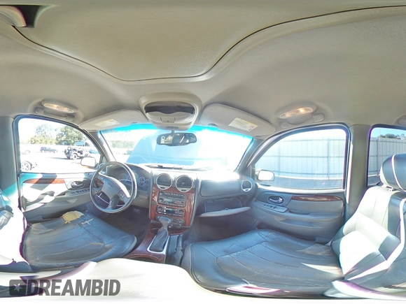 2002 GMC Envoy SLT with VIN 1GKDS13SX22301062, listed as a Copart auction lot 81791024 with 0 mi miles and Salvage Title. Bid and sale history available at carsss.com. Image 13.