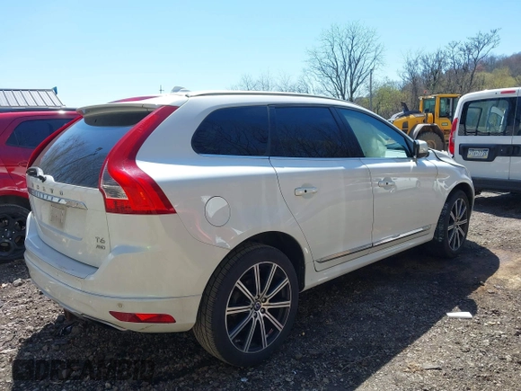 2014 Volvo XC60 R-Design Premier Plus with VIN YV4902DZ8E2545061, listed as a IAAI auction lot 42071863 with 90,718 mi miles and . Bid and sale history available at DreamBid. Image 4.