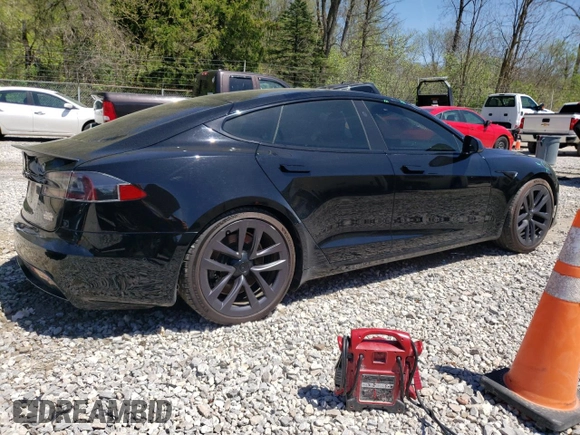 2021 Tesla Model S Plaid with VIN 5YJSA1E63MF451391, listed as a Copart auction lot 54821985 with 50,480 mi miles and Salvage title. Bid and sale history available at DreamBid. Image 3.