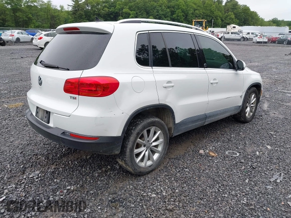 2017 Volkswagen Tiguan Wolfsburg Edition with VIN WVGRV7AX9HK002659, listed as a IAAI auction lot 42482438 with 88,841 mi miles and . Bid and sale history available at DreamBid. Image 4.