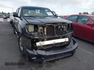 2010 Toyota Tacoma PreRunner with VIN 3TMJU4GN6AM100507, listed as a IAAI auction lot 41499801 with 212,437 mi miles and . Bid and sale history available at DreamBid. Image 1.