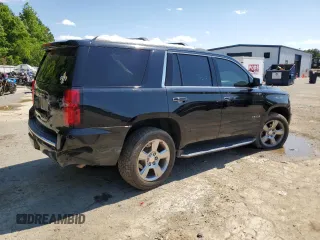 2018 Chevrolet Tahoe Premier with VIN 1GNSKCKC1JR133625, listed as a Copart auction lot 54900974 with 130,921 mi miles and Salvage title. Bid and sale history available at DreamBid. Image 3.