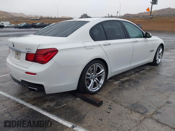 2013 BMW 7 Series 740i with VIN WBAYA6C57DC995338, listed as a IAAI auction lot 41479077 with 123,680 mi miles and . Bid and sale history available at DreamBid. Image 4.