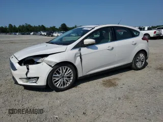 2015 Ford Focus Titanium with VIN 1FADP3N24FL214429, listed as a Copart auction lot 59159075 with 157,353 mi miles and Salvage title. Bid and sale history available at DreamBid. Image 1.