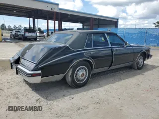1984 Cadillac Seville z VIN 1G6AS6988EE829387, wystawiony jako Copart lot #75061224 z przebiegiem 643 mil mil oraz Szkody całkowita. Historia ofert i sprzedaży dostępna na DreamBid. Obrazek 3.