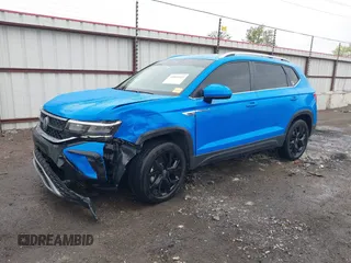 2023 Volkswagen Taos SE z VIN 3VVNX7B28PM305652, wystawiony jako IAAI lot #41892522 z przebiegiem 50 644 mil mil oraz . Historia ofert i sprzedaży dostępna na DreamBid. Obrazek 17.