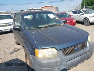 2001 Ford Escape XLT with VIN 1FMYU04131KA35322, listed as a IAAI auction lot 42584785 with 134,838 mi miles and . Bid and sale history available at DreamBid. Image 1.