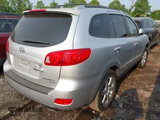 2009 Hyundai Santa Fe SE z VIN 5NMSH13E09H255761, wystawiony jako IAAI lot #42419450 z przebiegiem 252 937 mil mil oraz . Historia ofert i sprzedaży dostępna na DreamBid. Obrazek 4.