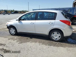 2010 Nissan Versa SL with VIN 3N1BC1CP7AL447706, listed as a Copart auction lot 57443545 with 126,107 mi miles and Salvage title. Bid and sale history available at DreamBid. Image 2.