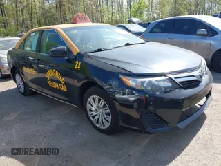 2013 Toyota Camry L with VIN 4T1BF1FK4DU665225, listed as a IAAI auction lot 42094282 with 410,885 mi miles. Bid and sale history available at carsss.com. Image 1.