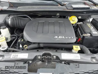 2016 Dodge Grand Caravan SXT with VIN 2C4RDGCG0GR102699, listed as a IAAI auction lot 42221564 with 229,250 mi miles and . Bid and sale history available at DreamBid. Image 10.