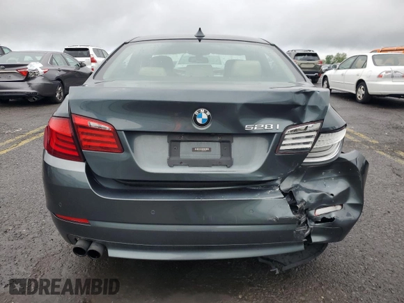 2012 BMW 5 Series 528i xDrive z VIN WBAXH5C56CDW06599, wystawiony jako Copart lot #55239355 z przebiegiem 129 520 mil mil oraz Szkoda całkowita • Salvage title. Historia ofert i sprzedaży dostępna na DreamBid. Obrazek 6.