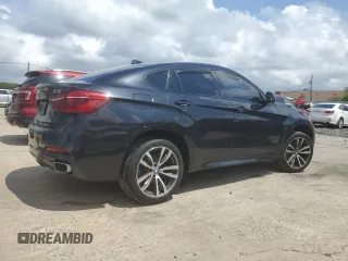 2015 BMW X6 xDrive35i z VIN 5UXKU2C58F0N77513, wystawiony jako Copart lot #55859345 z przebiegiem 82 560 mil mil oraz Szkoda całkowita • Salvage title. Historia ofert i sprzedaży dostępna na DreamBid. Obrazek 3.