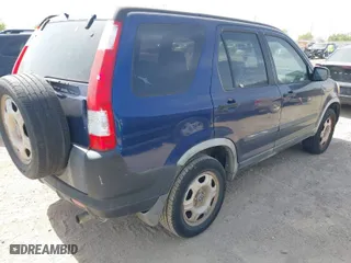 2005 Honda CR-V LX with VIN JHLRD68565C010765, listed as a IAAI auction lot 41843854 with 248,201 mi miles. Bid and sale history available at carsss.com. Image 4.