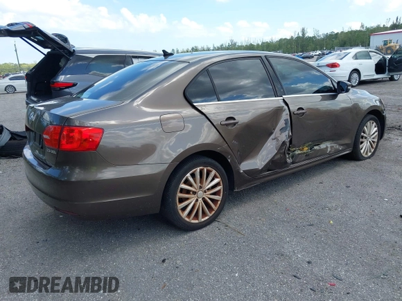 2012 Volkswagen Jetta Sedan SEL w/Sunroof with VIN 3VWLX7AJ9CM409833, listed as a IAAI auction lot 42008181 with 185,803 mi miles. Bid and sale history available at carsss.com. Image 13.