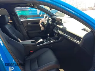 2024 Honda Civic Sport Touring z VIN 19XFL1G85RE026665, wystawiony jako IAAI lot #41735645 z przebiegiem 5025 mil mil oraz . Historia ofert i sprzedaży dostępna na DreamBid. Obrazek 5.