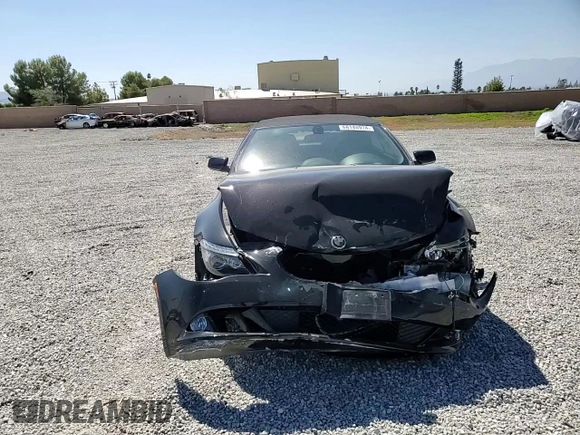 2009 BMW 6 Series 650i with VIN WBAEB53569C224337, listed as a Copart auction lot 68148974 with 75,057 mi miles and Salvage Title. Bid and sale history available at carsss.com. Image 10.