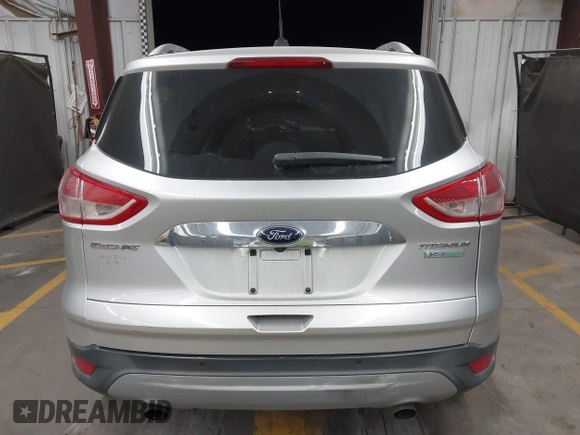 2015 Ford Escape Titanium with VIN 1FMCU0J96FUB81598, listed as a IAAI auction lot 41872114 with 122,001 mi miles and . Bid and sale history available at DreamBid. Image 16.