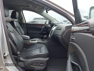 2015 Cadillac SRX Performance Collection z VIN 3GYFNCE36FS633386, wystawiony jako IAAI lot #41851338 z przebiegiem 102 586 mil mil oraz . Historia ofert i sprzedaży dostępna na DreamBid. Obrazek 5.