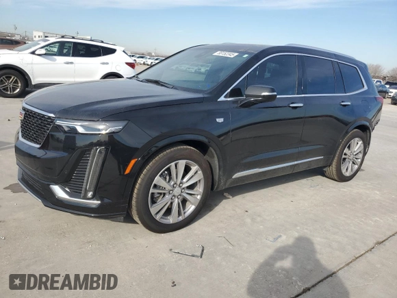 2024 Cadillac XT6 FWD Premium Luxury with VIN 1GYKPCRS7RZ710803, listed as a Copart auction lot 88152345 with 10,409 mi miles and Salvage Title. Bid and sale history available at carsss.com. Image 1.
