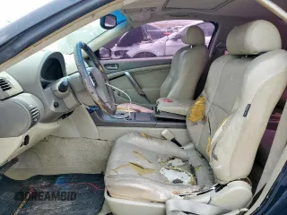 2004 Infiniti G35 w/Leather z VIN JNKCV54E34M826310, wystawiony jako Copart lot #59636735 z przebiegiem 215 769 mil mil oraz Szkoda całkowita • Salvage title. Historia ofert i sprzedaży dostępna na DreamBid. Obrazek 7.