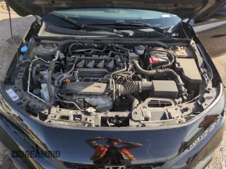 2023 Honda Civic Sport Touring z VIN 19XFL1H85PE402177, wystawiony jako Copart lot #52611605 z przebiegiem 56 306 mil mil oraz Szkoda całkowita • Salvage title. Historia ofert i sprzedaży dostępna na DreamBid. Obrazek 11.
