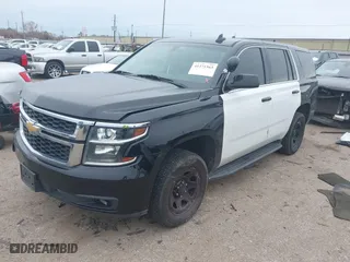 2018 Chevrolet Tahoe Commercial with VIN 1GNLCDEC1JR312458, listed as a IAAI auction lot 41371563 with 114,086 mi miles. Bid and sale history available at carsss.com. Image 17.