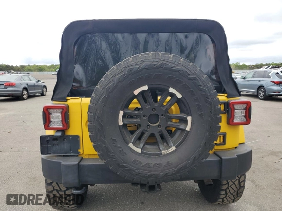 2009 Jeep Wrangler Unlimited Rubicon with VIN 1J8GA69109L761089, listed as a Copart auction lot 57975985 with 195,530 mi miles and Salvage title. Bid and sale history available at DreamBid. Image 6.