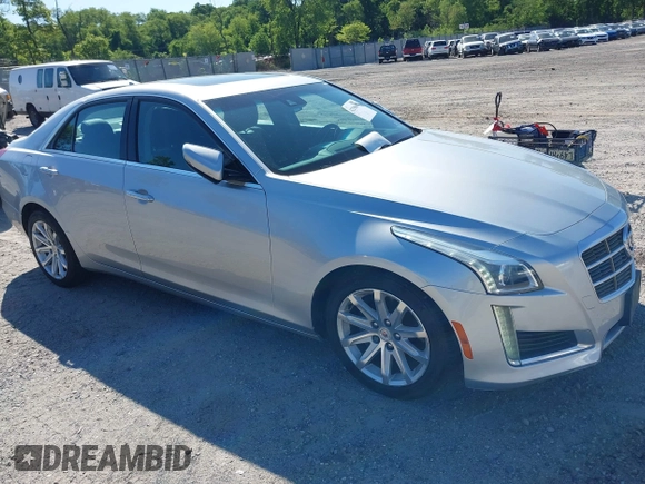 2014 Cadillac CTS Luxury AWD with VIN 1G6AX5S34E0124464, listed as a IAAI auction lot 42298607 with 89,351 mi miles and . Bid and sale history available at DreamBid. Image 1.