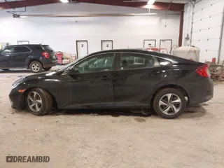 2019 Honda Civic Sedan LX with VIN 2HGFC2F69KH555697, listed as a IAAI auction lot 41664312 with 112,993 mi miles. Bid and sale history available at carsss.com. Image 14.