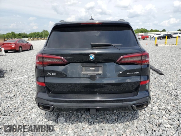 2023 BMW X5 xDrive40i with VIN 5UXCR6C07P9R18608, listed as a Copart auction lot 55911595 with Not provided miles and Salvage title. Bid and sale history available at DreamBid. Image 6.