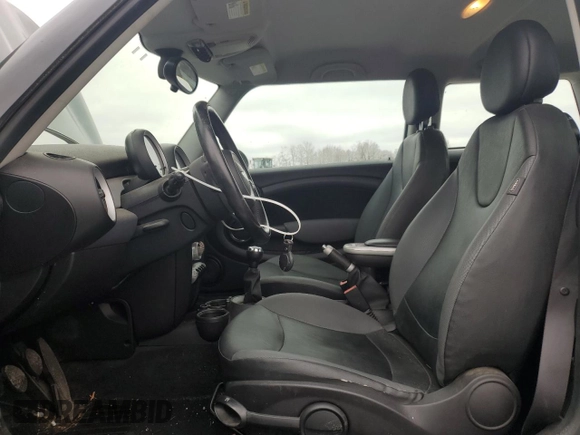 2008 MINI Hardtop with VIN WMWMF33538TU68174, listed as a Copart auction lot 52599285 with 150,496 mi miles and Salvage Title. Bid and sale history available at DreamBid. Image 7.