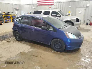 2009 Honda Fit with VIN JHMGE88229S044859, listed as a Copart auction lot 52742495 with 398,726 mi miles and Salvage Title. Bid and sale history available at carsss.com. Image 4.